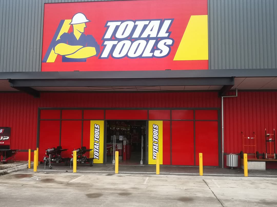 Commercial vinyl signage and storefront wrap installed for Total Tools by TMC Tinting Sydney