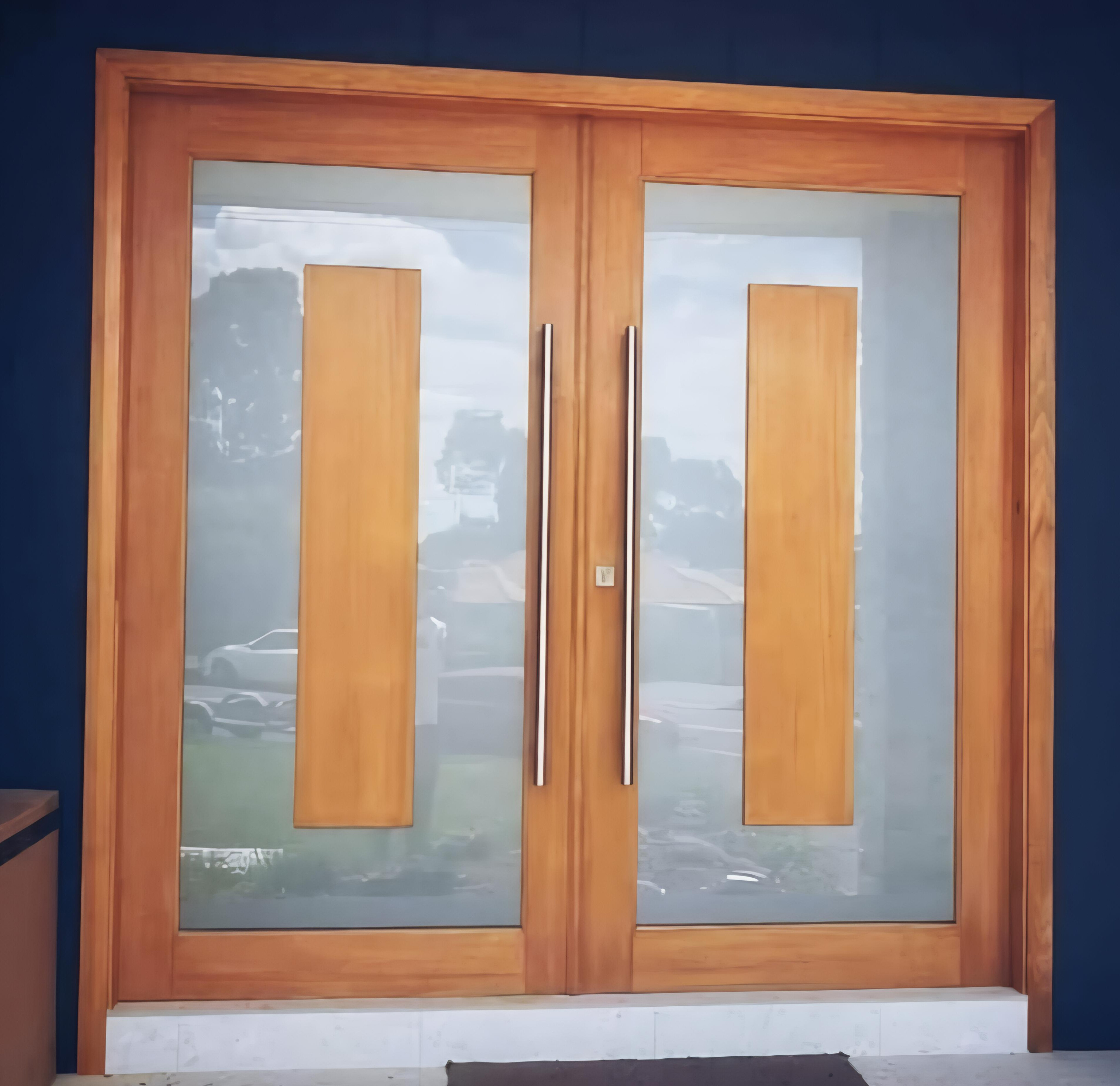 Frosted border film on double timber entry doors with rose gold handles Newport Northern Beaches — TMC Tinting