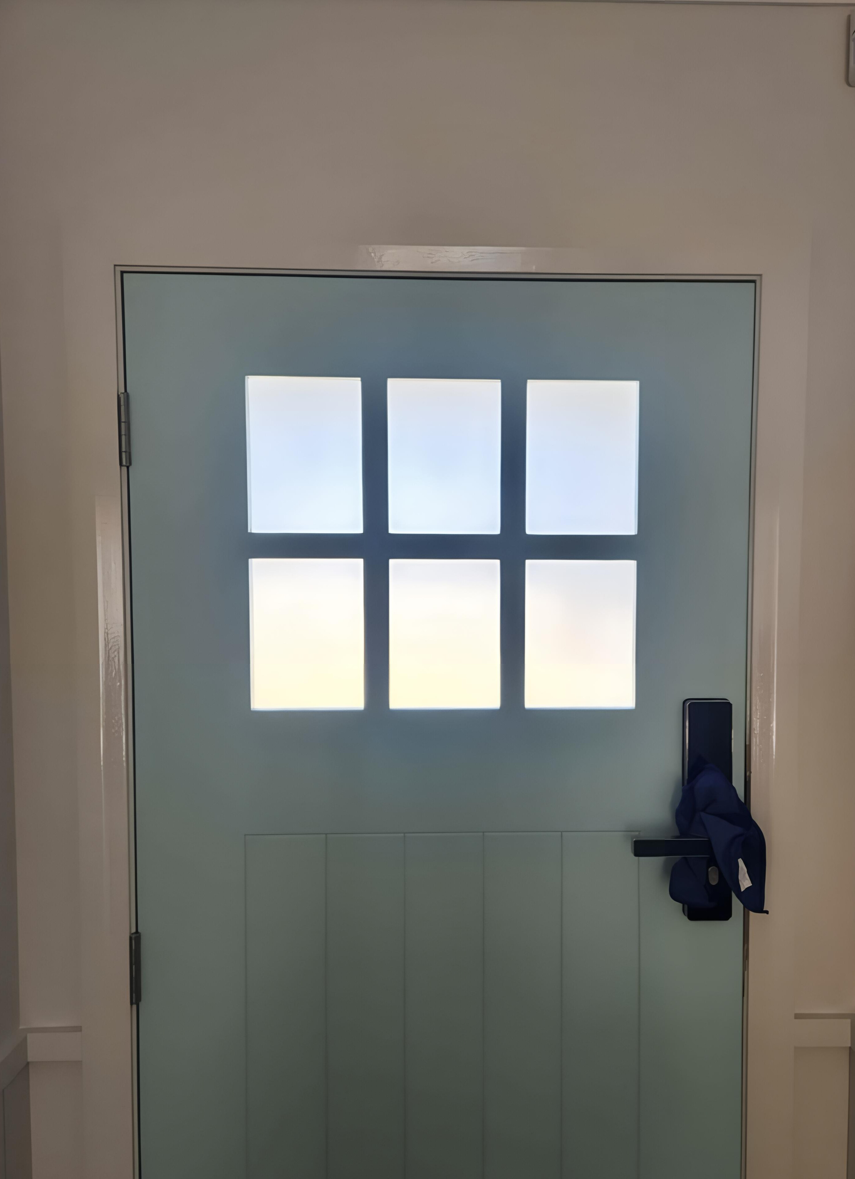 Frosted window film on 6-pane residential front door in Thirroul Wollongong — TMC Tinting Sydney