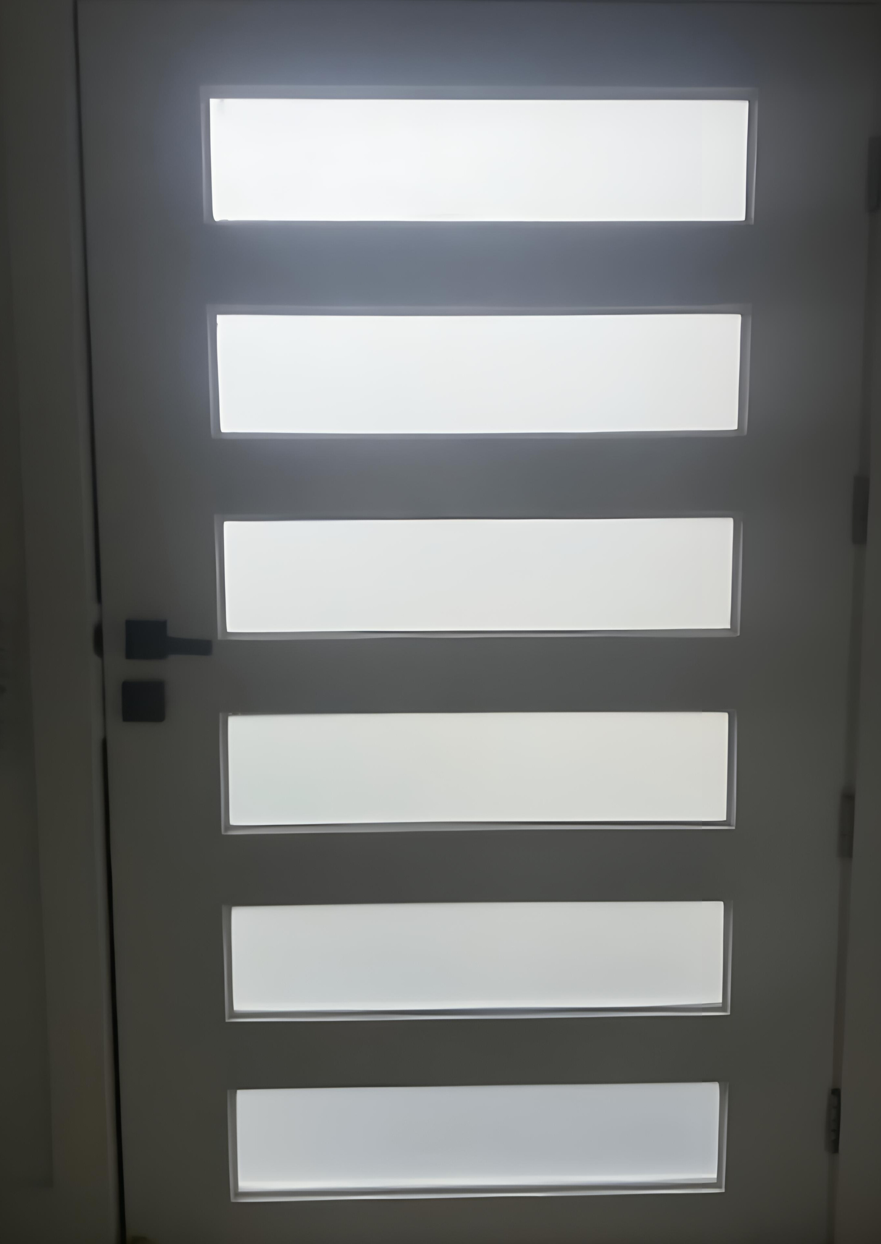 Frosted window film on 6-strip charcoal contemporary front door Bilgola Northern Beaches — TMC Tinting