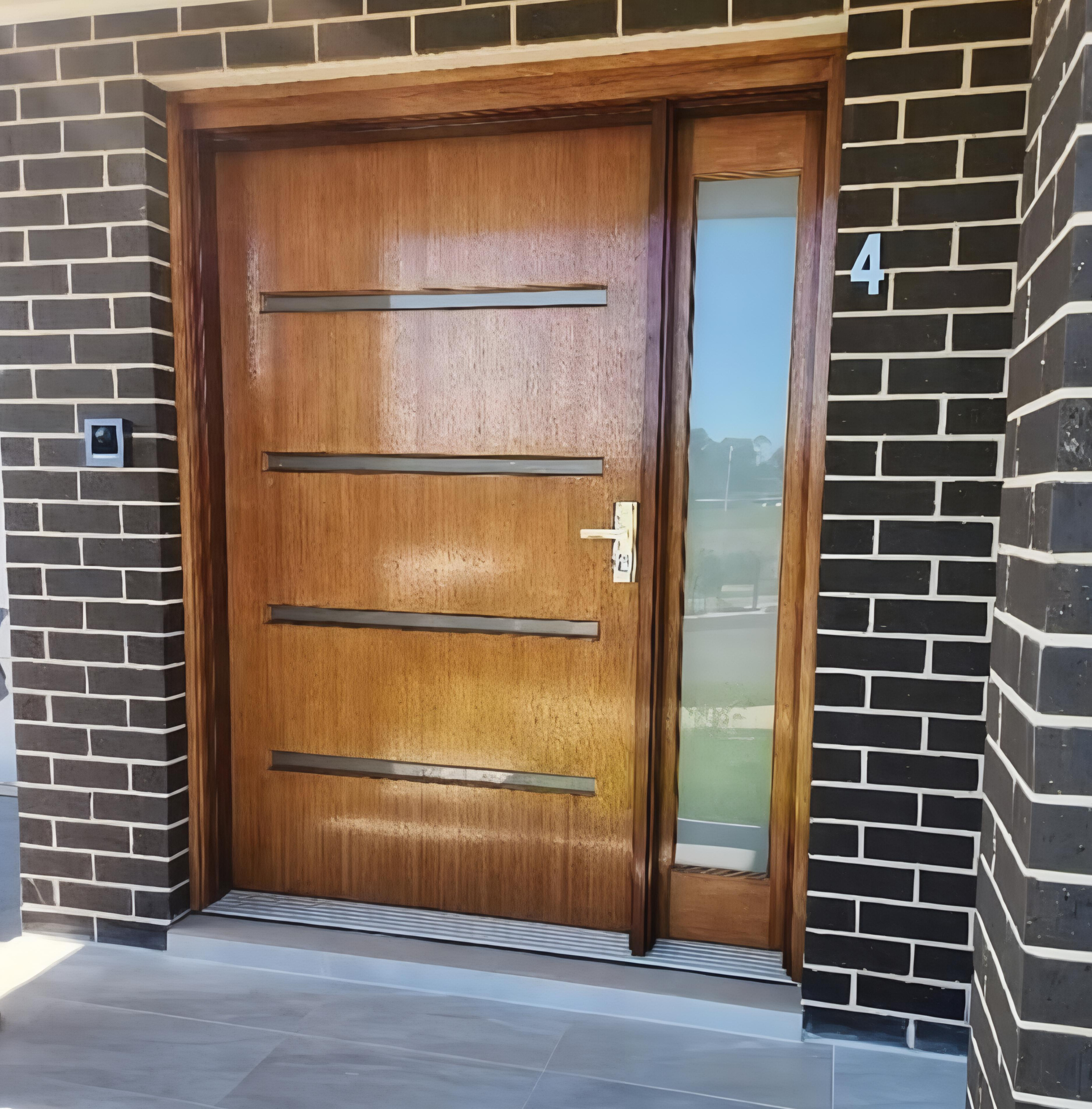 Frosted film on timber front door strips and full sidelight panel new build Woonona Wollongong — TMC Tinting