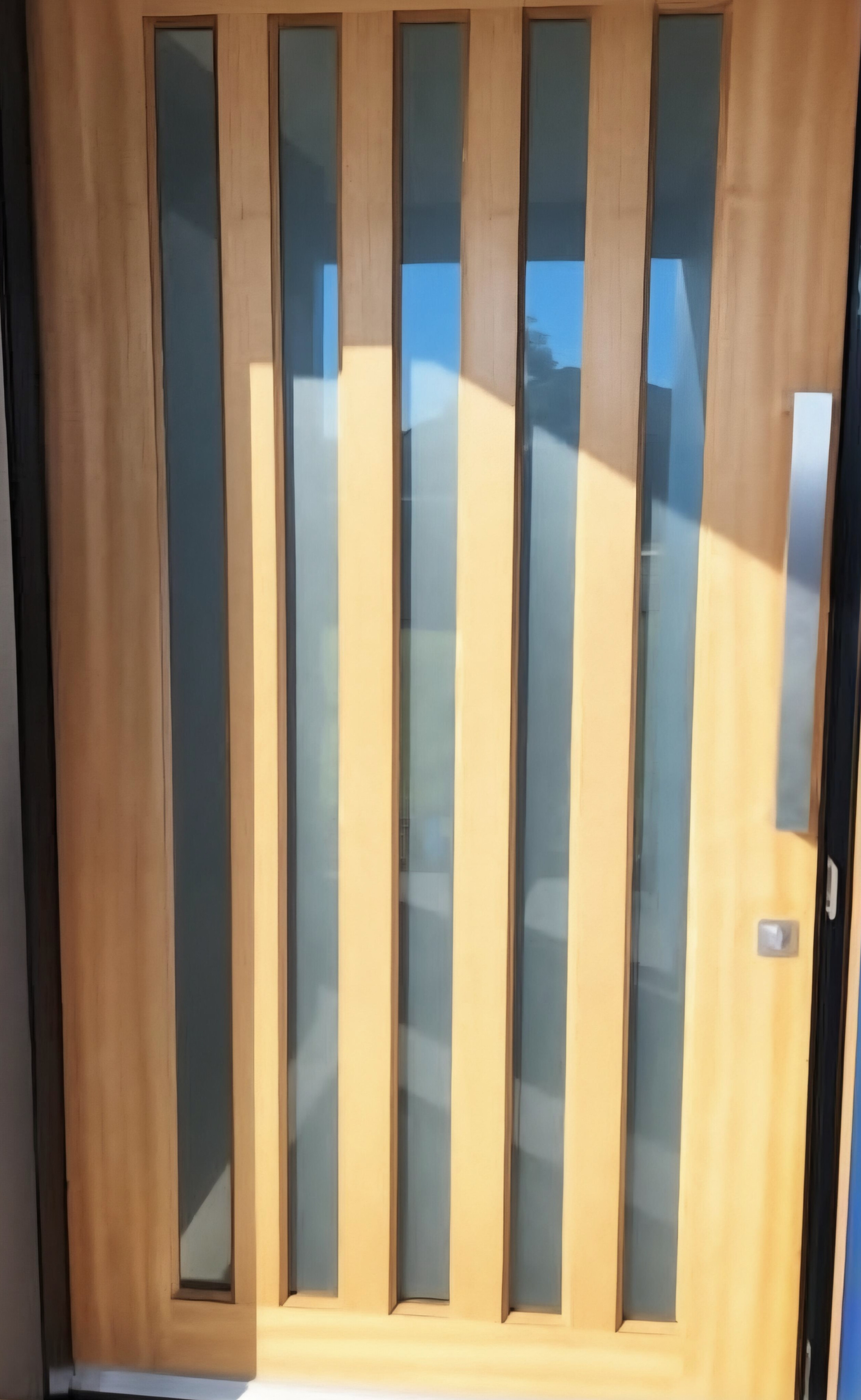 Frosted window film on vertical strip contemporary timber front door Whale Beach Northern Beaches — TMC Tinting