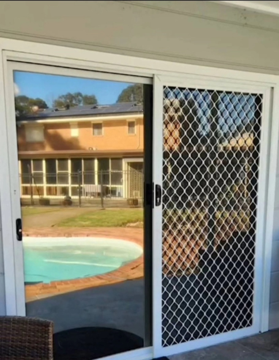 Residential sliding door window tint installed by TMC Tinting Sydney — heat & glare reduction 0449 582 777